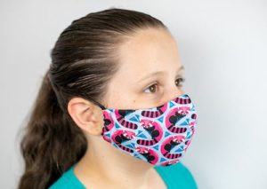 Girl wearing an eco-friendly face mask.