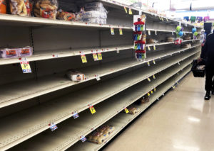 Empty shelves in a supermarket.