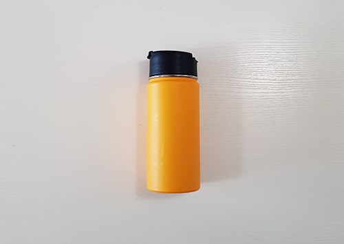 Reusable water bottle or tea mug to reduce waste.