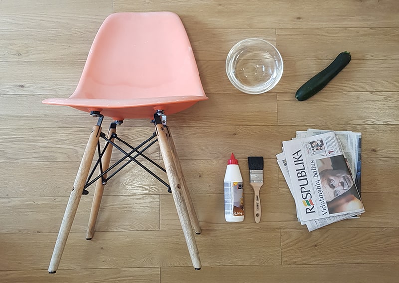 Old chair with tools to make a craft.